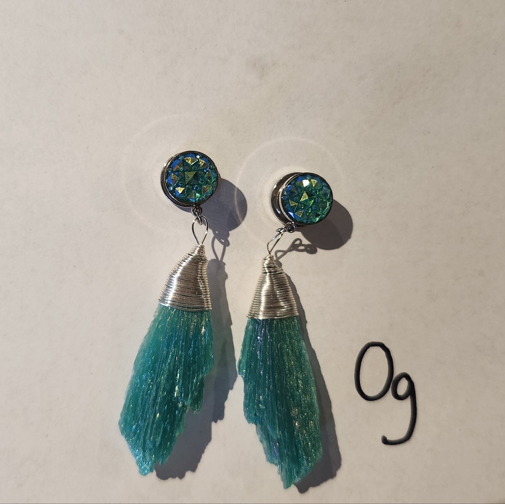 Silver And Teal Gauges